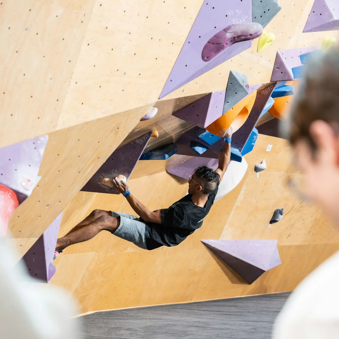 Bouldering at a climbing gym